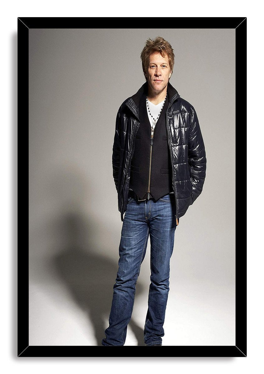 Jon Bon Jovi framed wall art print displays a full-length gray studio portrait in a glossy black frame with a white border.