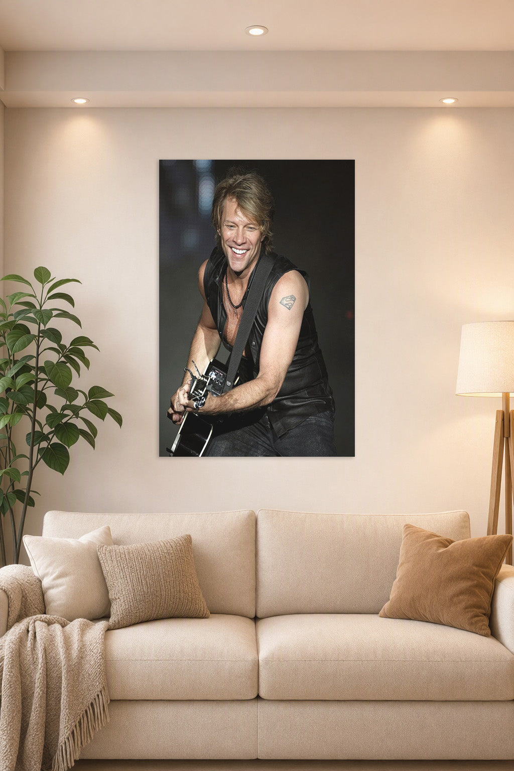 Jon Bon Jovi in a bright living room above a beige sofa.