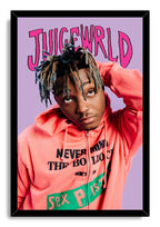 Juice Wrld framed wall art print presents a portrait in a coral hoodie with vivid pink JUICEWRLD lettering on lavender.