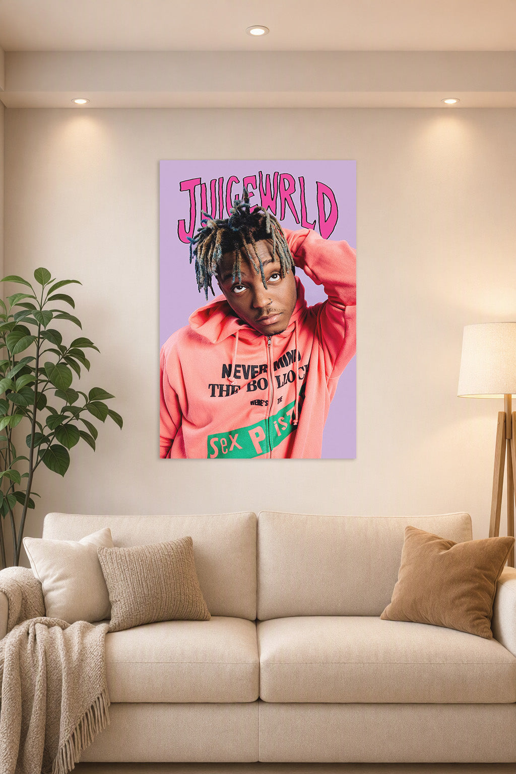 Juice Wrld in a bright living room above a beige sofa.