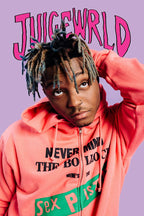 Juice Wrld wall art print features a close portrait in a coral hoodie beneath bold pink JUICEWRLD lettering on lavender.