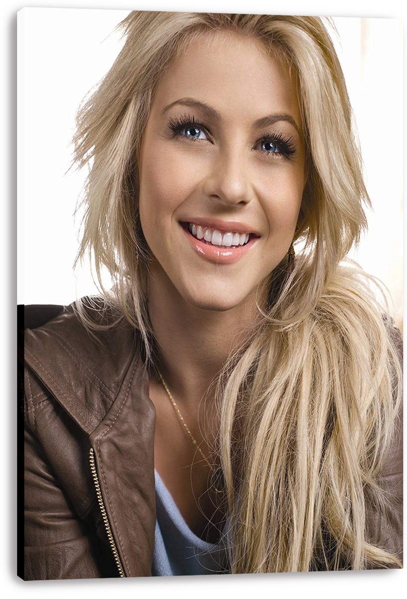 Julianne Hough canvas wall art print featuring her smiling blonde portrait in a brown leather jacket against white.