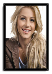 Julianne Hough framed wall art print with a black border, portraying her smiling in a brown leather jacket.