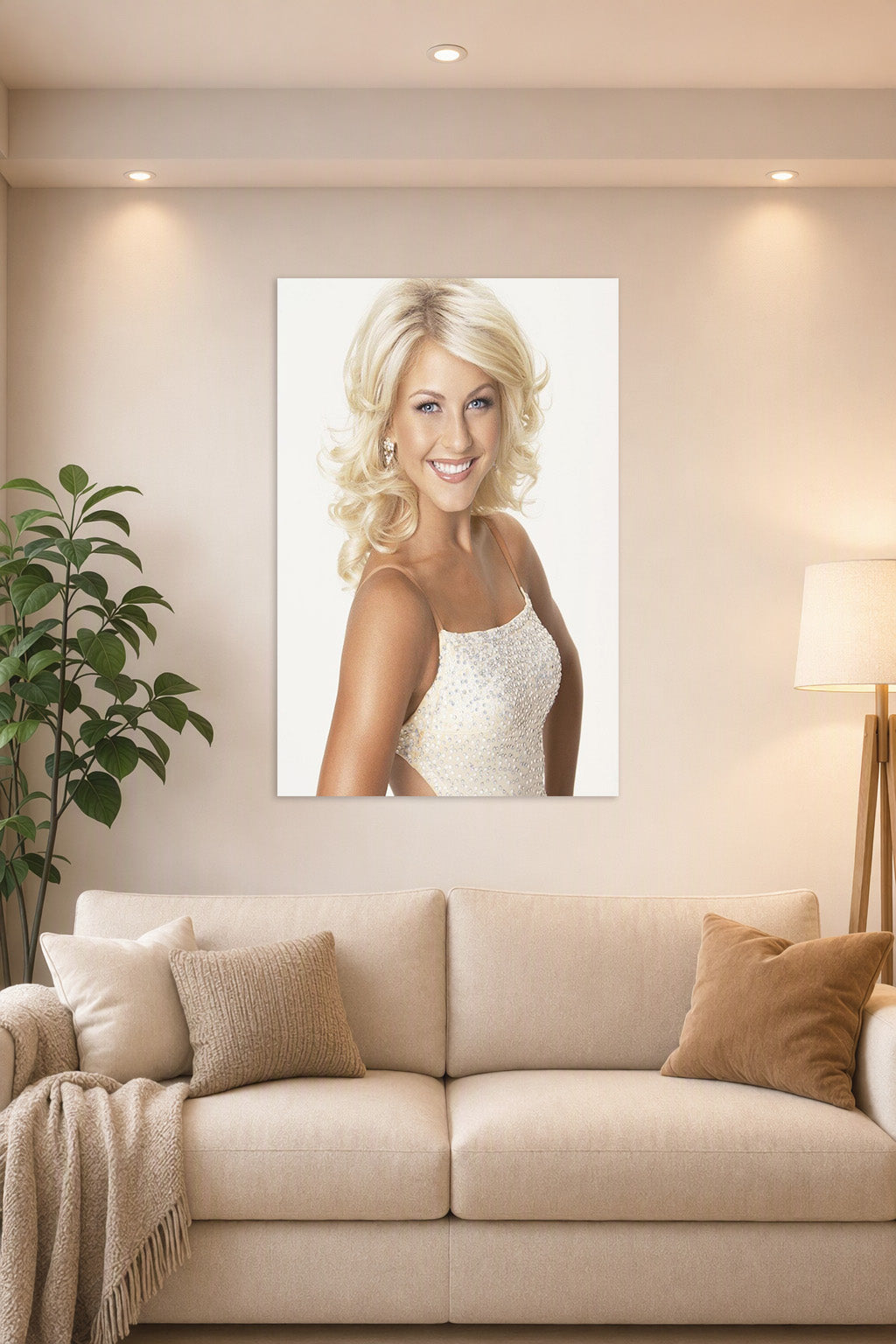 Julianne Hough in a bright living room above a beige sofa.