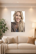 Julianne Hough in a bright living room above a beige sofa.