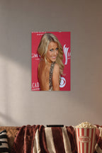Julianne Hough in a cozy movie room above a brown sofa with popcorn.