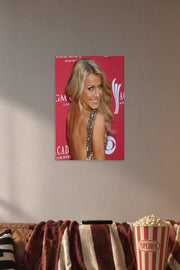 Julianne Hough in a cozy movie room above a brown sofa with popcorn.