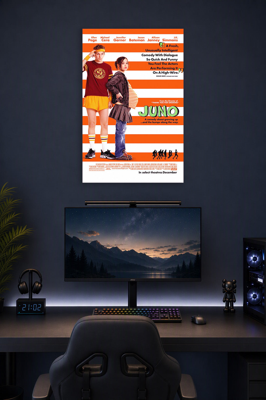 Juno Movies in a gaming desk setup above a monitor.