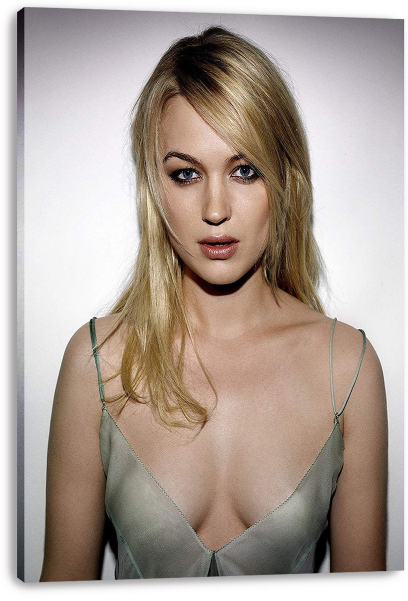 Juno Temple canvas wall art print presents a front-facing blonde portrait in a pale green dress on a light background.