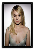 Juno Temple framed wall art print features her close blonde portrait in a pale green dress within a black frame.