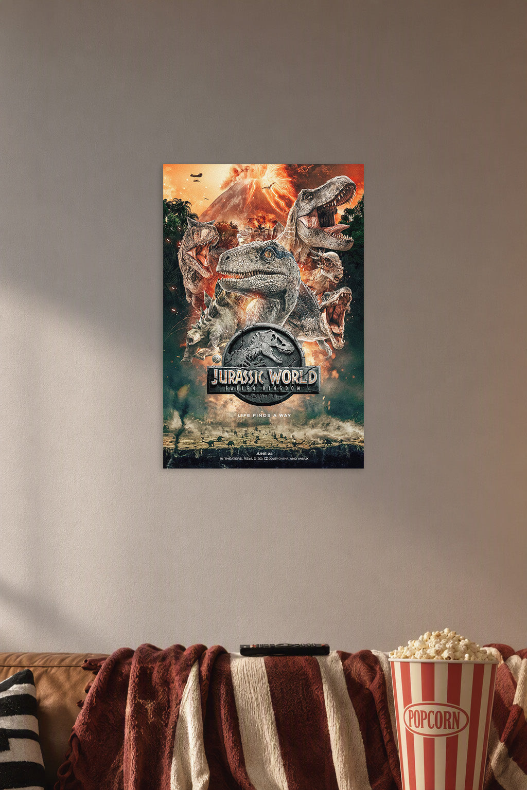 Jurassic World Fallen Kingdom Dinosaurs in a cozy movie room above a brown sofa with popcorn.