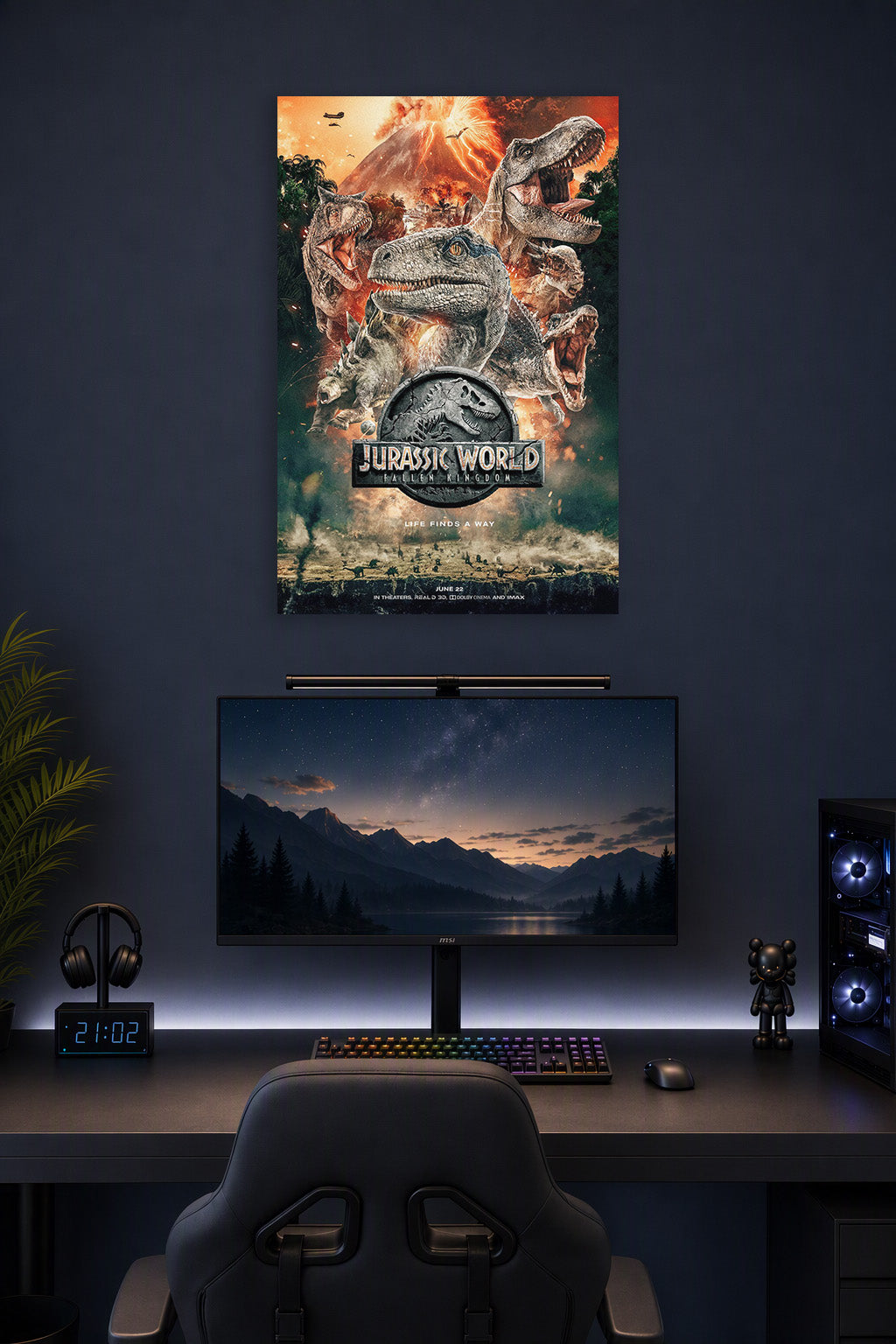 Jurassic World Fallen Kingdom Dinosaurs in a gaming desk setup above a monitor.