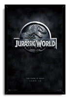 Jurassic World framed wall art print with a silver dinosaur skeleton emblem, bold title, and dark misty background.