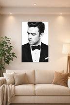 Justin Timberlake in a bright living room above a beige sofa.