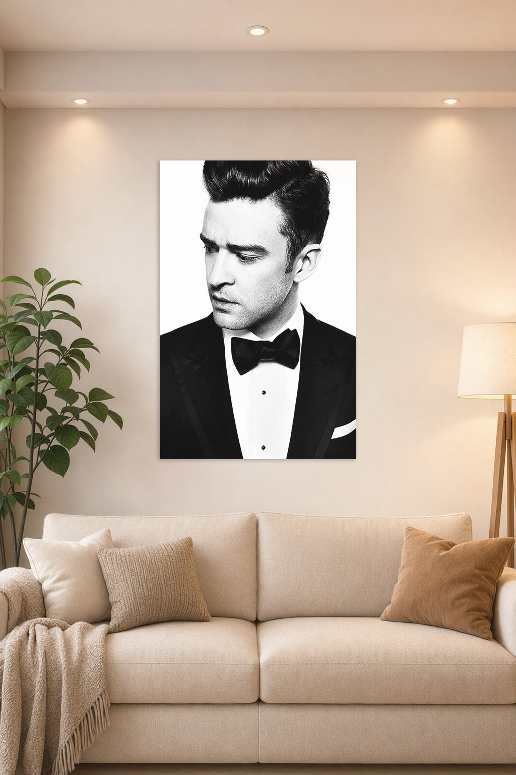 Justin Timberlake in a bright living room above a beige sofa.