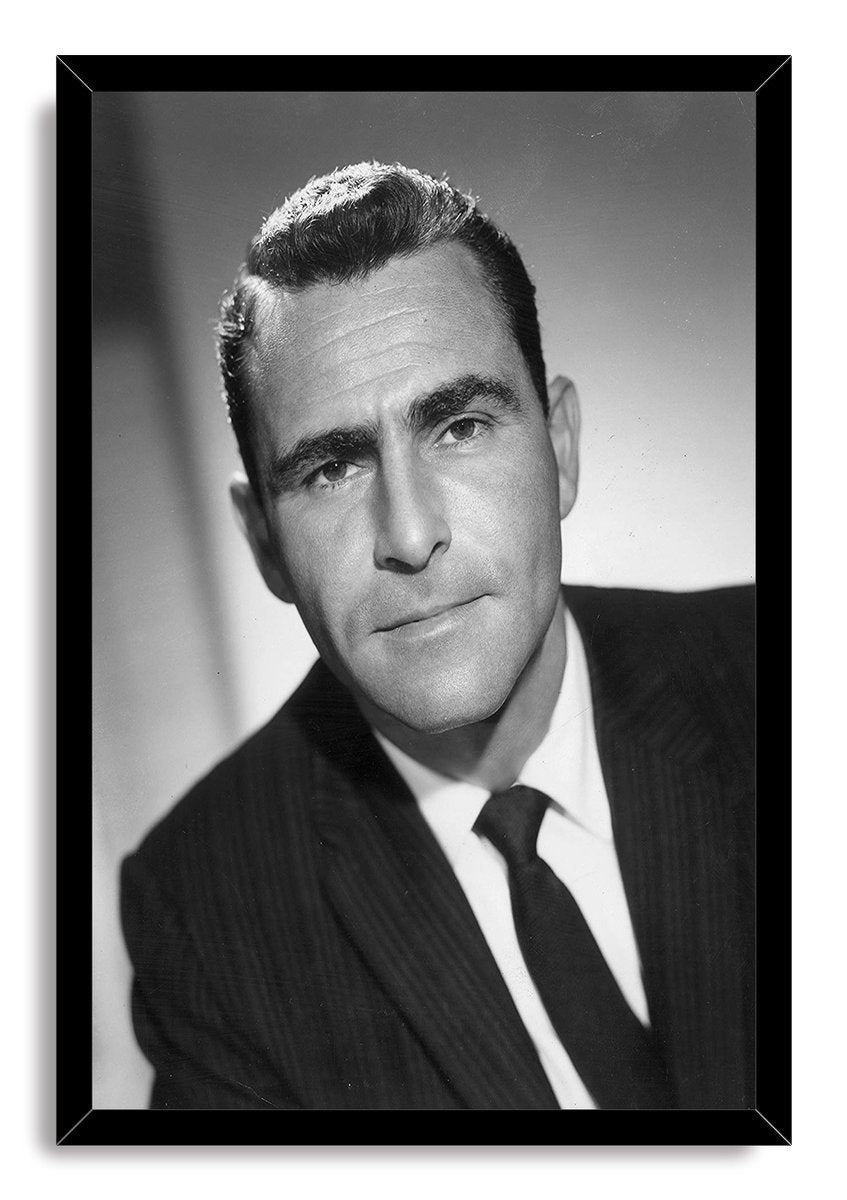 Karl Malden framed wall art print displays a black-and-white portrait of the actor in a suit within a glossy black mitered frame.