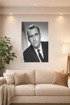 Karl Malden in a bright living room above a beige sofa.
