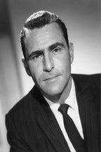 Karl Malden wall art print features a black-and-white close-up portrait of the actor in a dark pinstripe suit and tie.