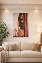 Kate Beckinsale in a bright living room above a beige sofa.
