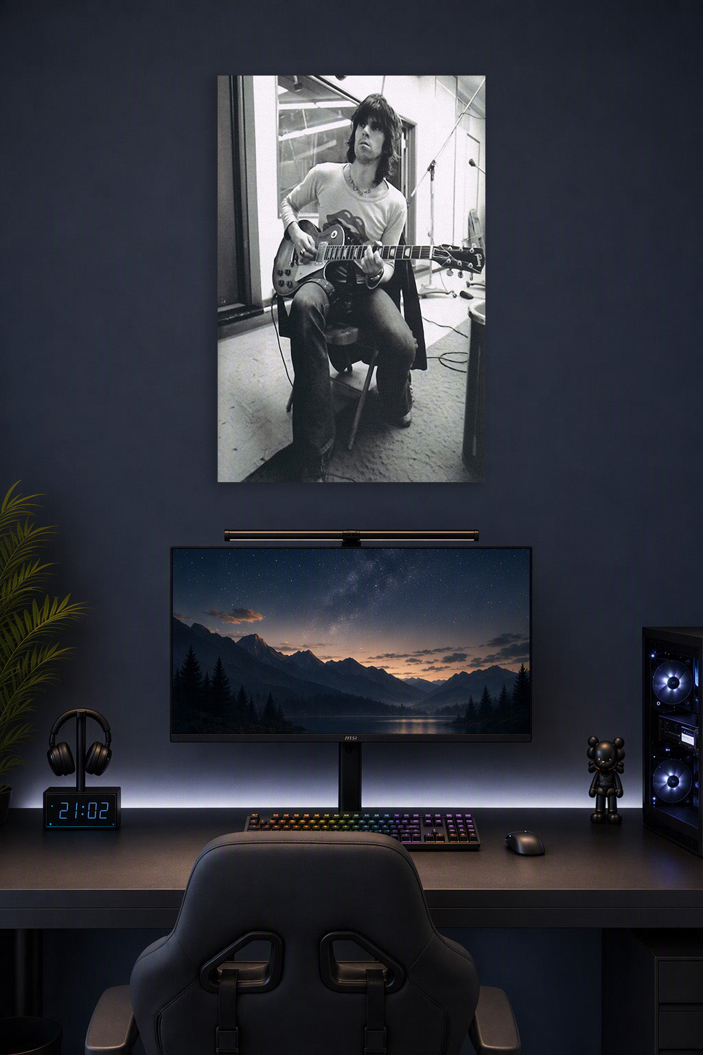 Keith Richards Rock Legend in a gaming desk setup above a monitor.
