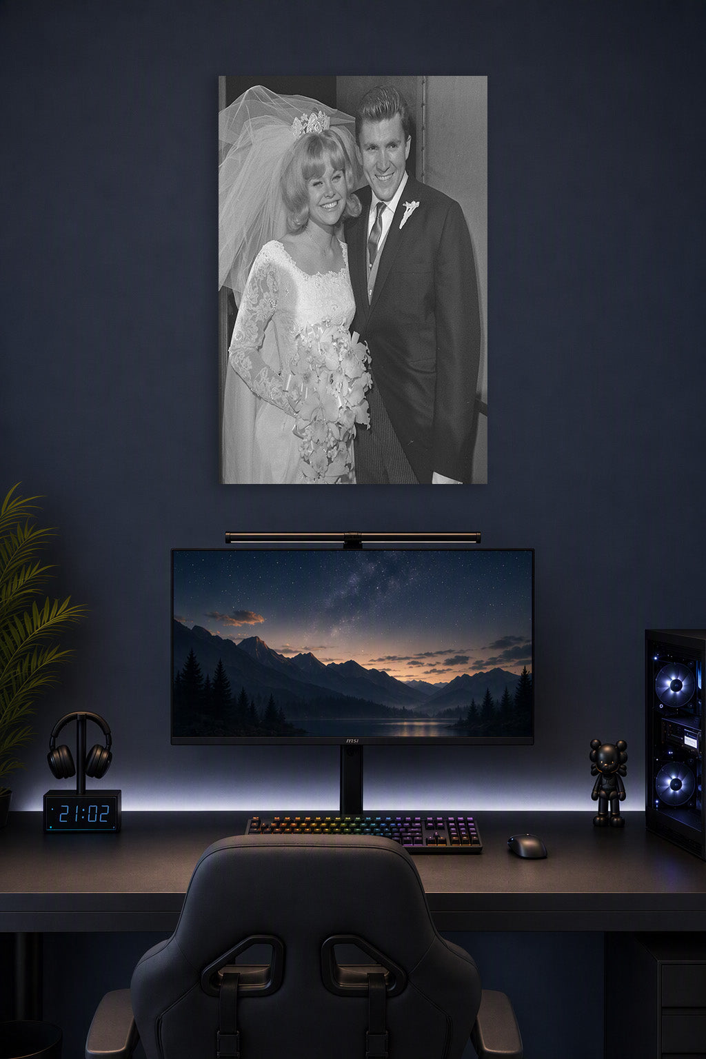 Kenny Lynch and Wife Vintage Wedding in a gaming desk setup above a monitor.