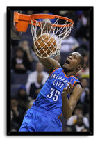 Kevin Durant framed wall art print depicts the Oklahoma City number 35 player dunking through a white net, set in a black frame.
