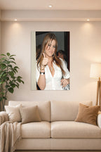 Khloé Kardashian in a bright living room above a beige sofa.