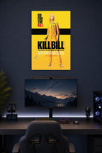 Kill Bill The Bride in a gaming desk setup above a monitor.