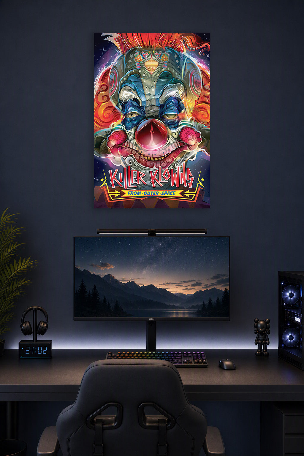 Killer Klowns From Outer Space in a gaming desk setup above a monitor.
