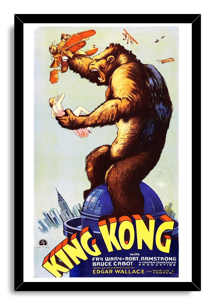 King Kong framed wall art print presents a roaring ape, a woman in his hand, and biplanes above the bold yellow title.
