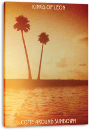 Kings of Leon Come Around Sundown canvas wall art print with silhouetted palms, a hazy golden sky, and sunlit water.