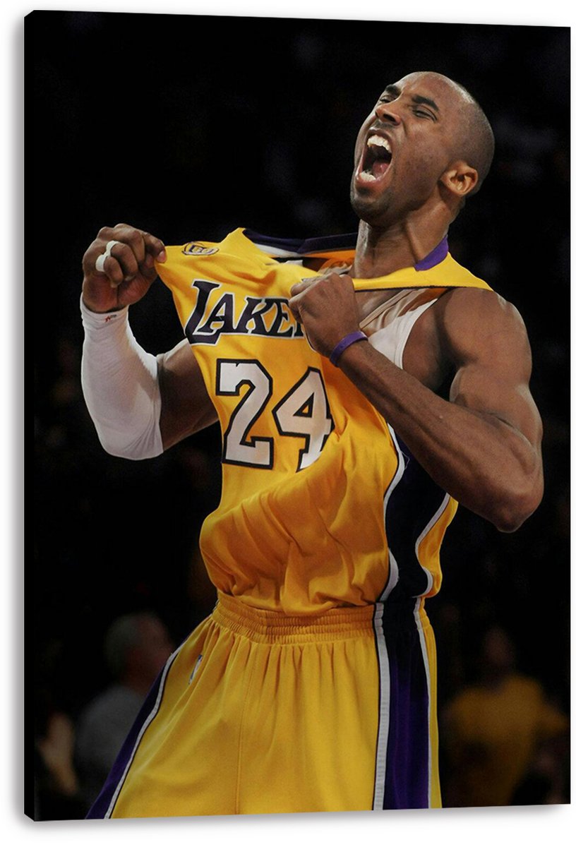 Kobe Bryant canvas wall art print features the athlete roaring and gripping his yellow Lakers number 24 jersey, displayed with wrapped edges.