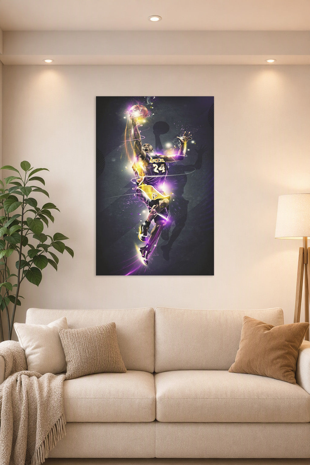 Kobe Bryant in a bright living room above a beige sofa.