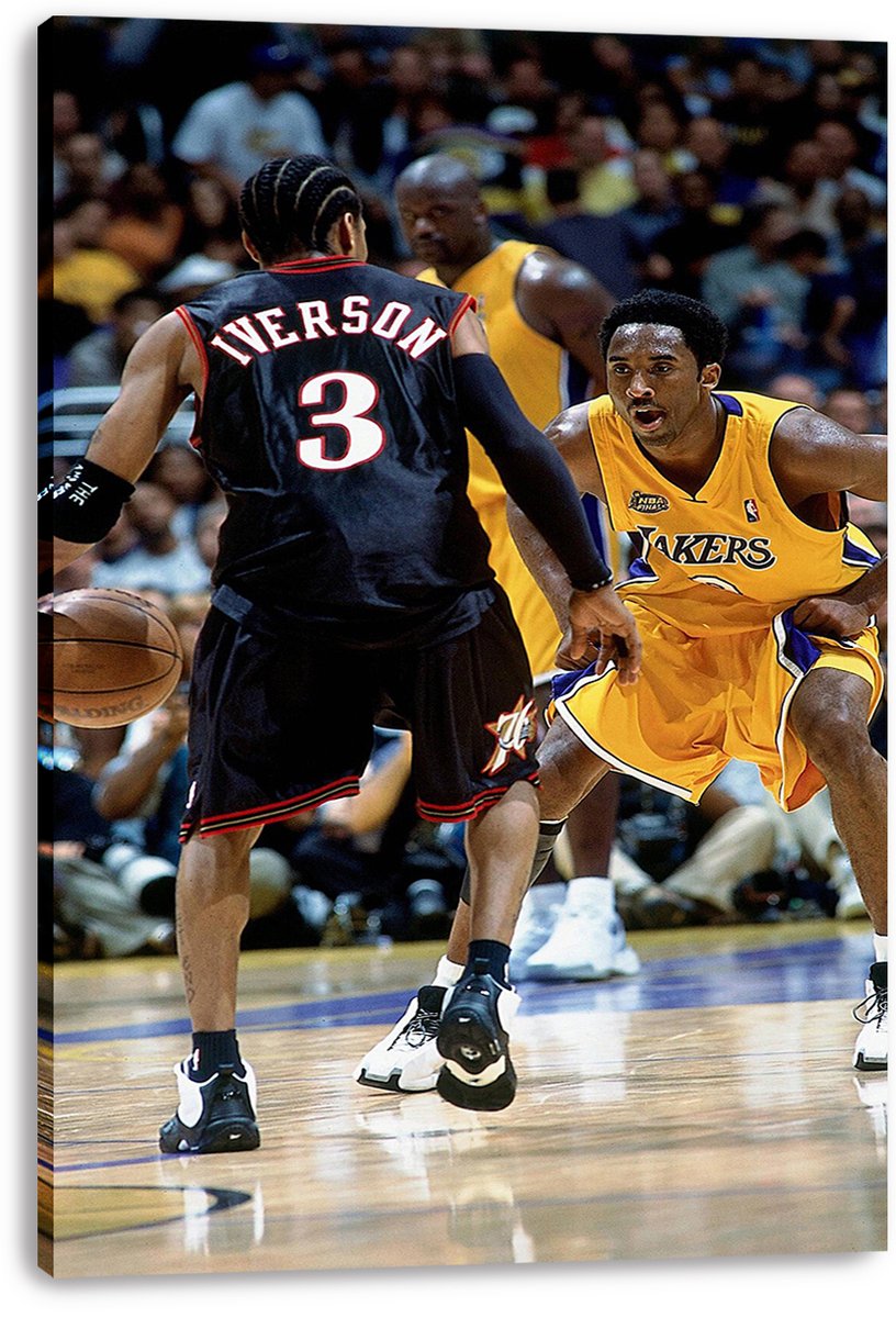Canvas wall art print of Allen Iverson in a black number 3 jersey dribbling as Kobe Bryant defends in gold, with a blurred arena crowd.