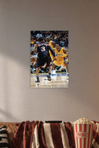 Kobe Bryant and Allen Iverson in a cozy movie room above a brown sofa with popcorn.