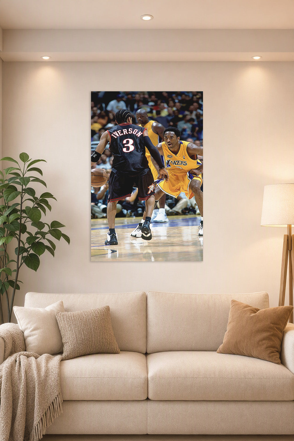 Kobe Bryant and Allen Iverson in a bright living room above a beige sofa.