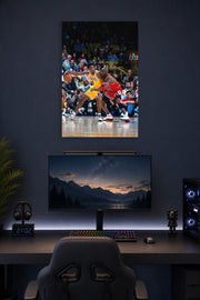 Kobe Bryant and Michael Jordan in a gaming desk setup above a monitor.