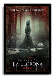La Llorona framed wall art print presents a spectral woman in a green-gray woodland pool, with red leaves and dramatic film typography.