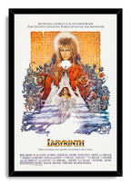 Labyrinth movie poster wall art print in a black frame, with Jareth, Sarah, a white castle, and whimsical creatures.