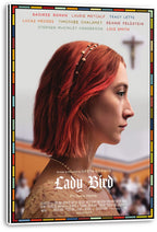 Lady Bird wall art print on a wrapped canvas features a red-haired woman in profile, a blurred cross, and colorful border.
