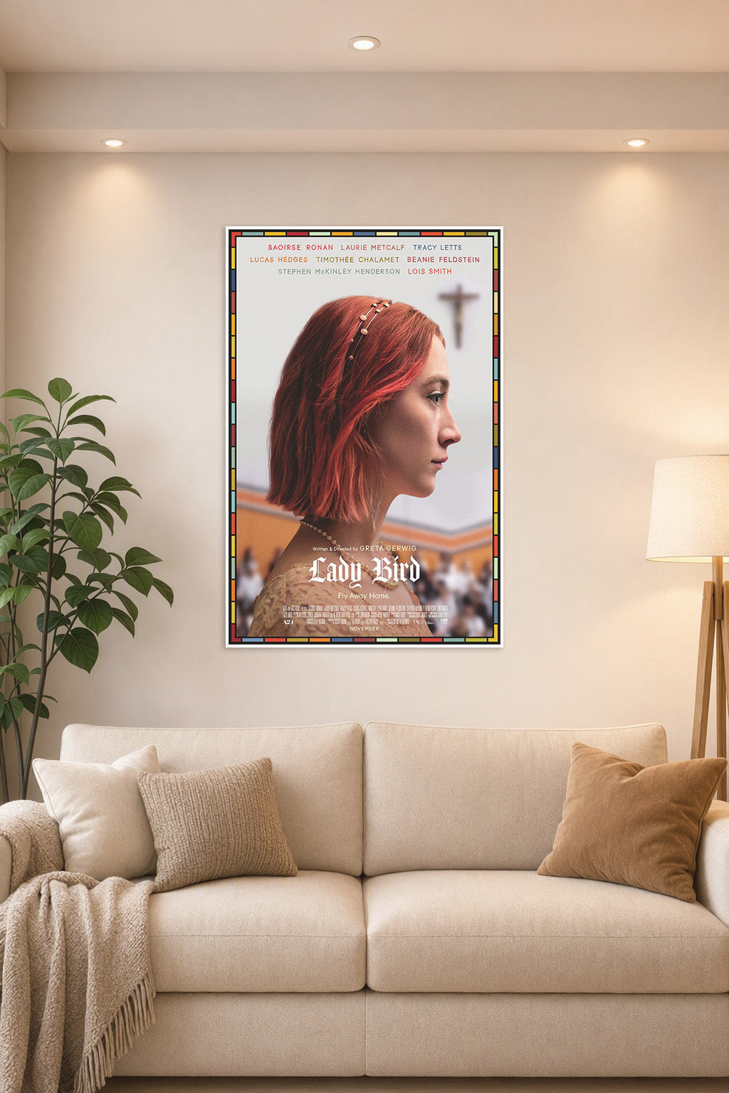 Lady Bird in a bright living room above a beige sofa.