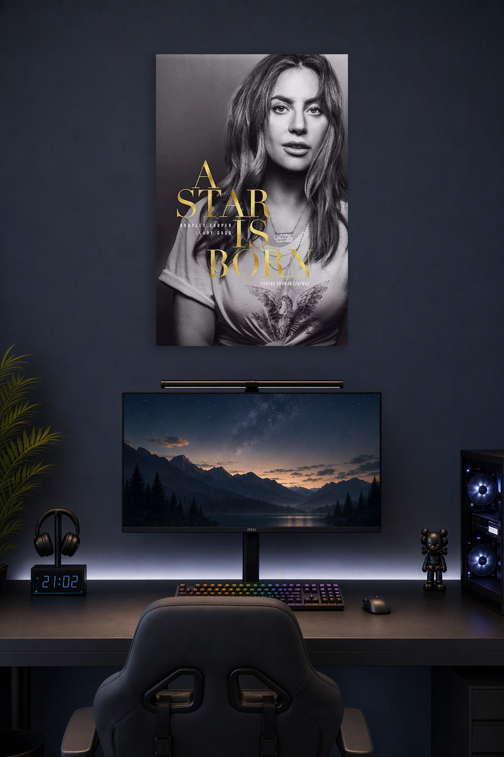 Lady Gaga A Star Is Born Movie in a gaming desk setup above a monitor.