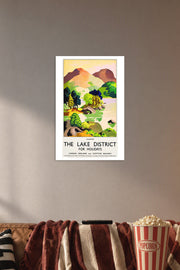 Lake District Ullswater Landscape in a cozy movie room above a brown sofa with popcorn.