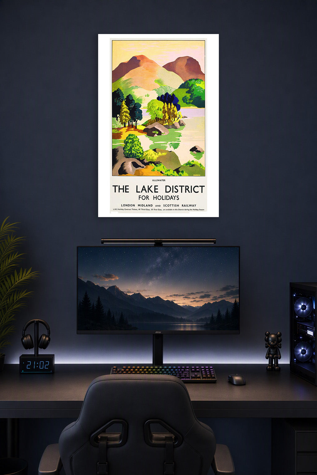 Lake District Ullswater Landscape in a gaming desk setup above a monitor.
