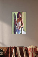 Lauren Cohan in a cozy movie room above a brown sofa with popcorn.