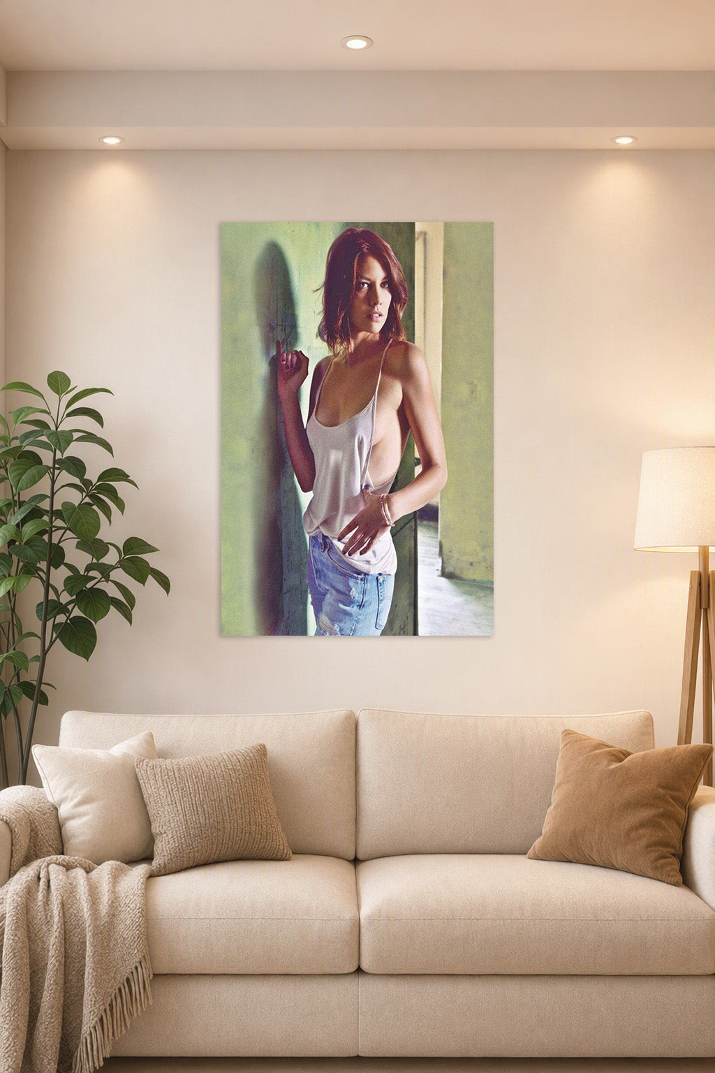 Lauren Cohan in a bright living room above a beige sofa.
