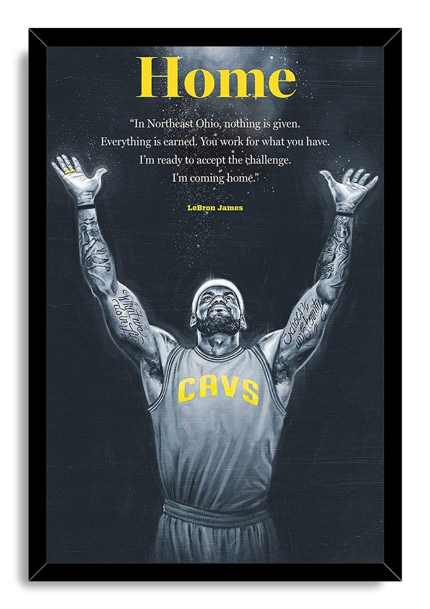 LeBron James framed wall art print in a black frame, with arms raised in a CAVS jersey under the yellow Home title.