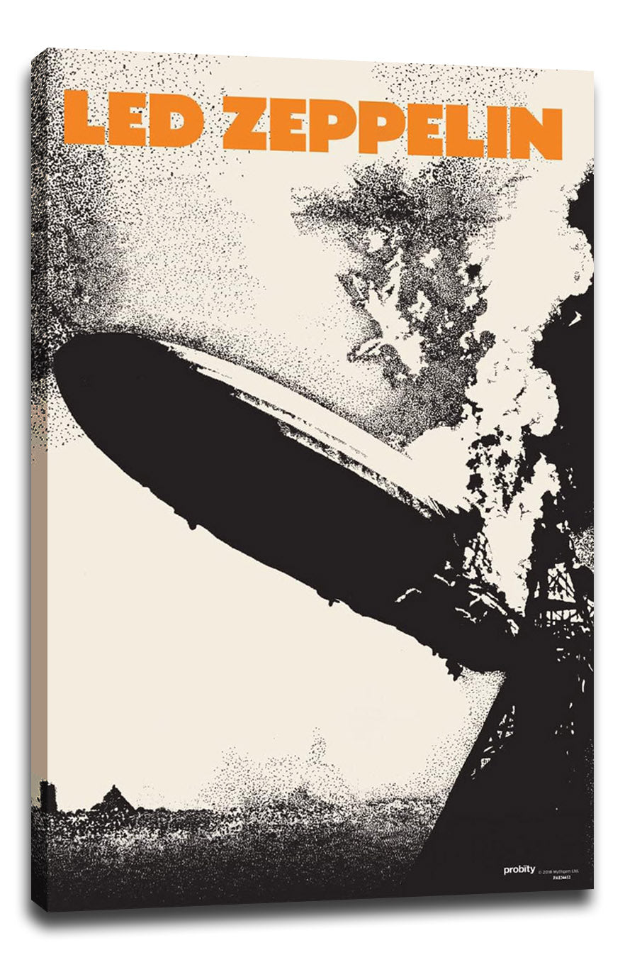 Led Zeppelin canvas wall art print with orange title text, a black zeppelin, smoky clouds, and a dark tower silhouette.