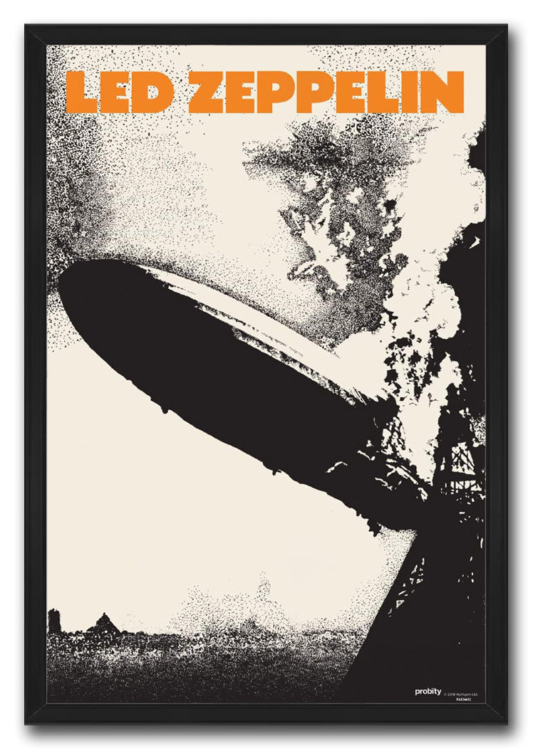 Led Zeppelin framed wall art print in a black frame, featuring an orange title, black zeppelin, smoke, and tower scene.