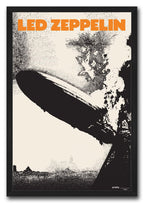 Led Zeppelin framed wall art print in a black frame, featuring an orange title, black zeppelin, smoke, and tower scene.